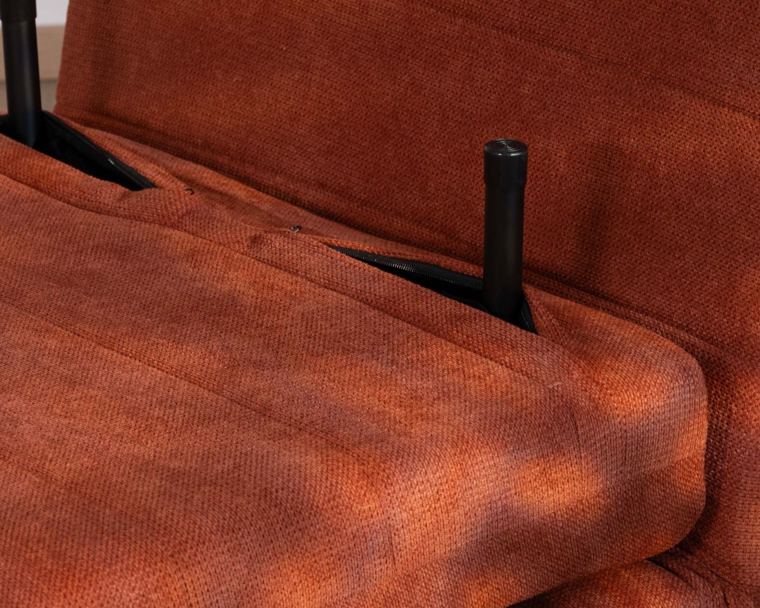 Poltrona di design scandinavo in tessuto terracotta "Folda" trasformabile in letto occasionale