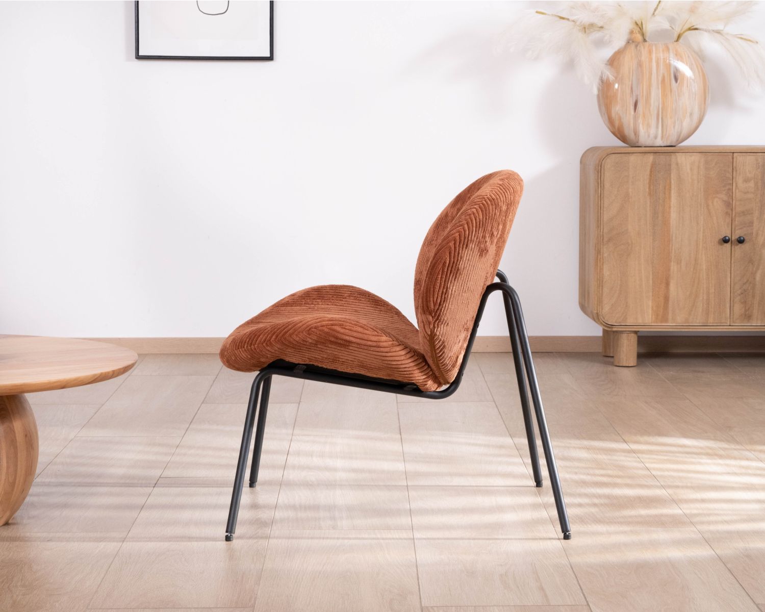 Poltrona lounge design "Sonate" in velluto a coste color ruggine