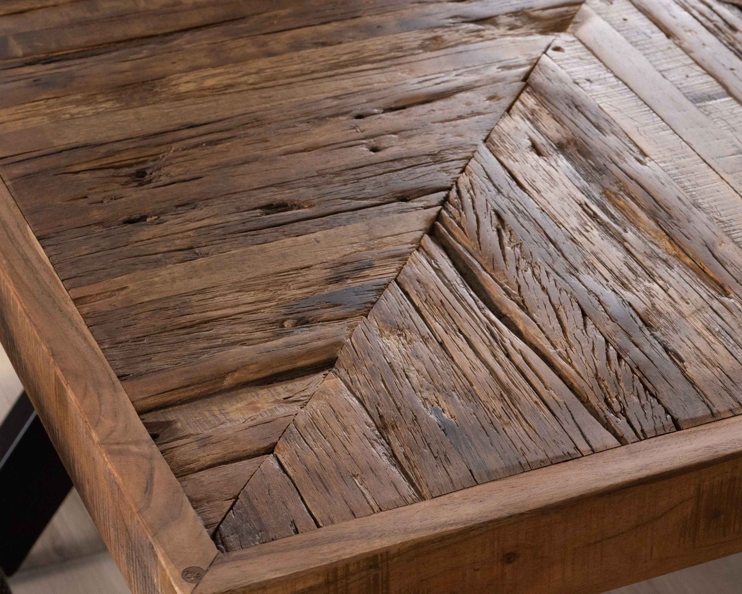 Tavolo da pranzo "Geonidum" quadrato da 140 cm in acacia a spina di pesce con gambe incrociate in metallo nero