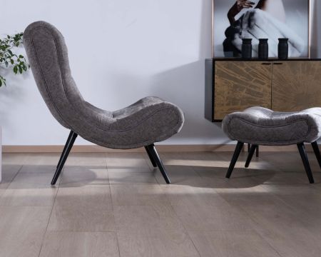 Poltrona comfort in velluto grigio "Caspe" con poggiapiedi