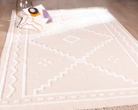 Tappeto beige tessuto a mano con motivi ricamati in bianco "Matis" dimensioni 120x180cm