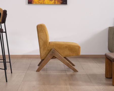 Poltrona "Tolga" in stile vintage con gambe a boomerang in giallo senape