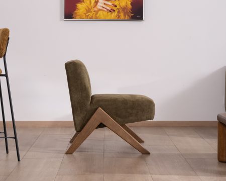 Poltrona "Tolga" in stile vintage in tessuto verde kaki chiaro con gambe a boomerang in legno